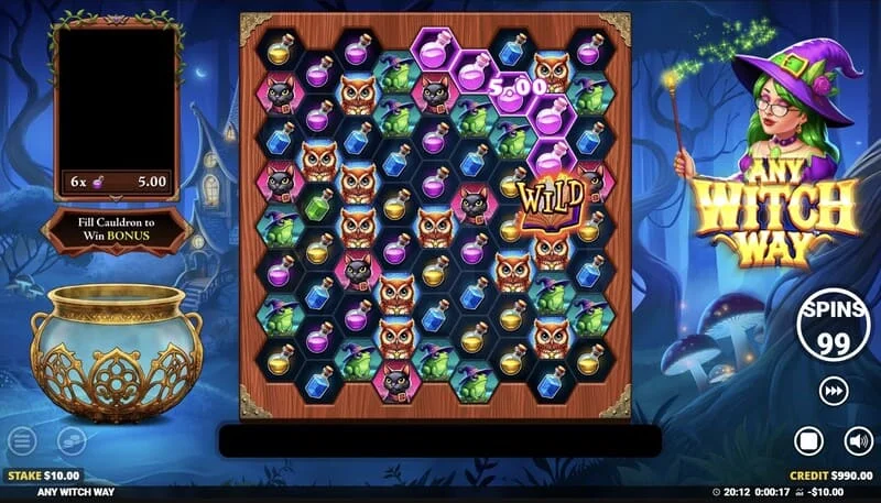 Any Witch Way – žaidimo ekranas su katilu ir 9x8 tinkleliu